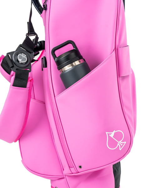 Bright pink Player Preferred Golf Bag featuring a side pocket with a water bottle, designed for stylish golfers.