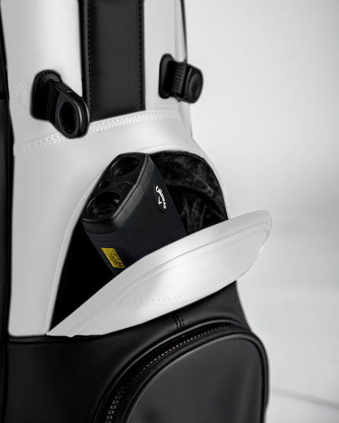 Player Preferred™ Golf Bag in Domino design, featuring a sleek white exterior and spacious compartments for golf clubs and accessories.